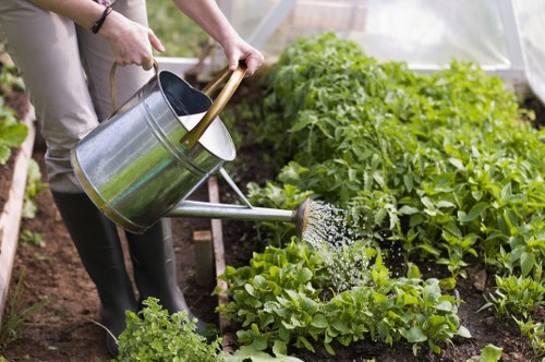 Gardening team preparing for a scheduled lawn maintenance visit